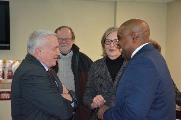 Dr. Barnes talking with community members